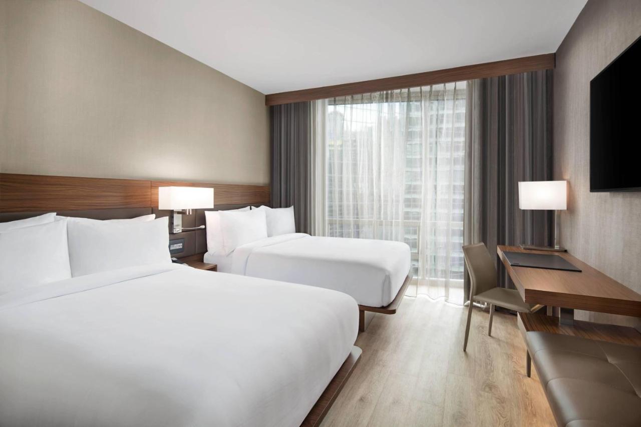 Doppelzimmer mit 2 Doppelbetten und Flussblick - Nichtraucher