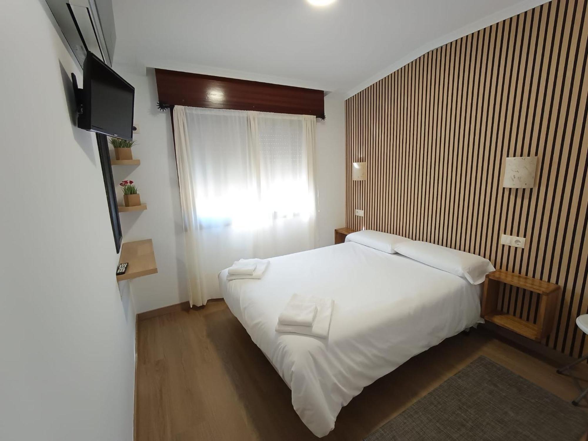Quarto Duplo com Casa de Banho Privativa