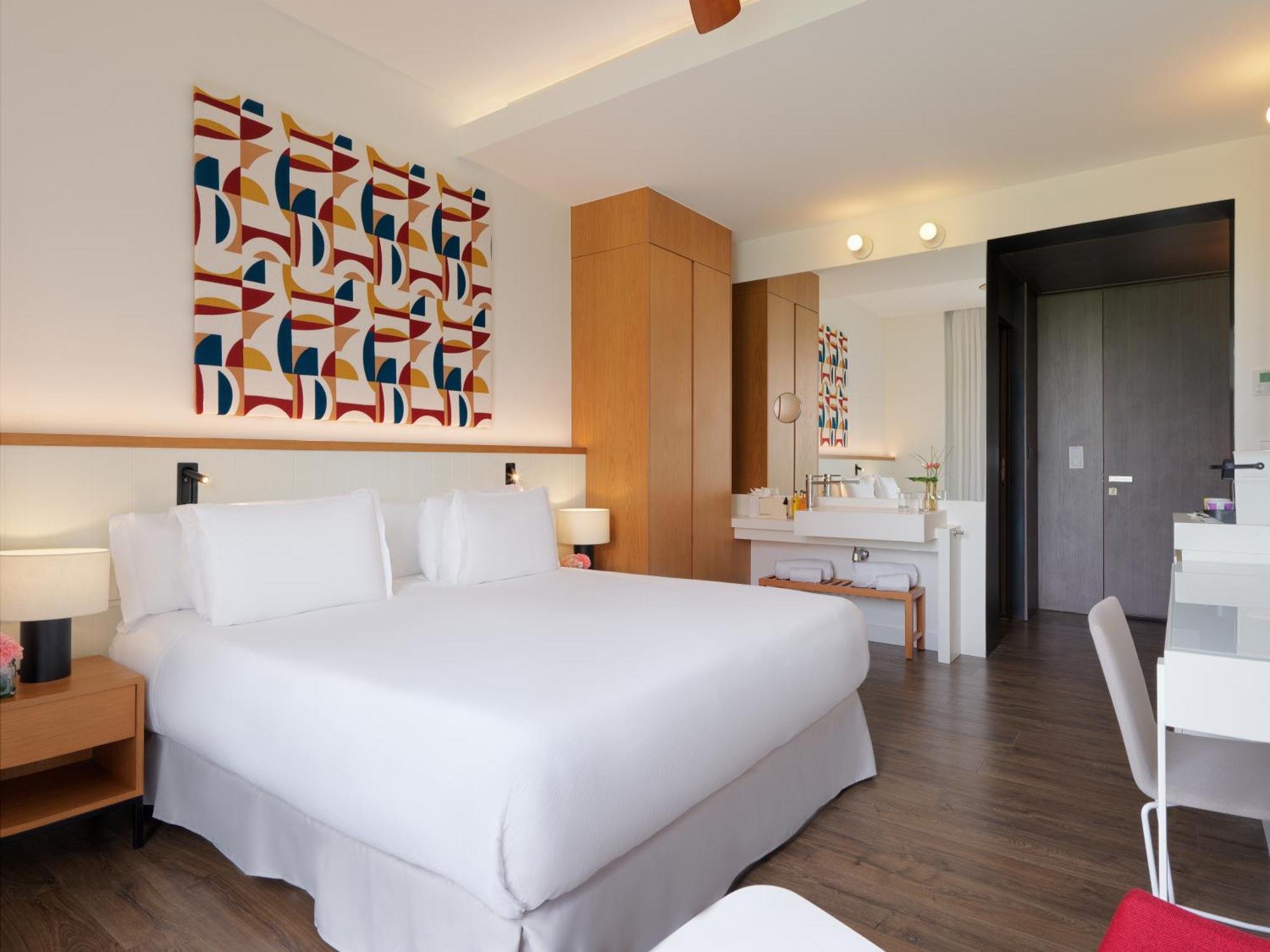 Quarto Triplo (2 Adultos + 1 Criança)