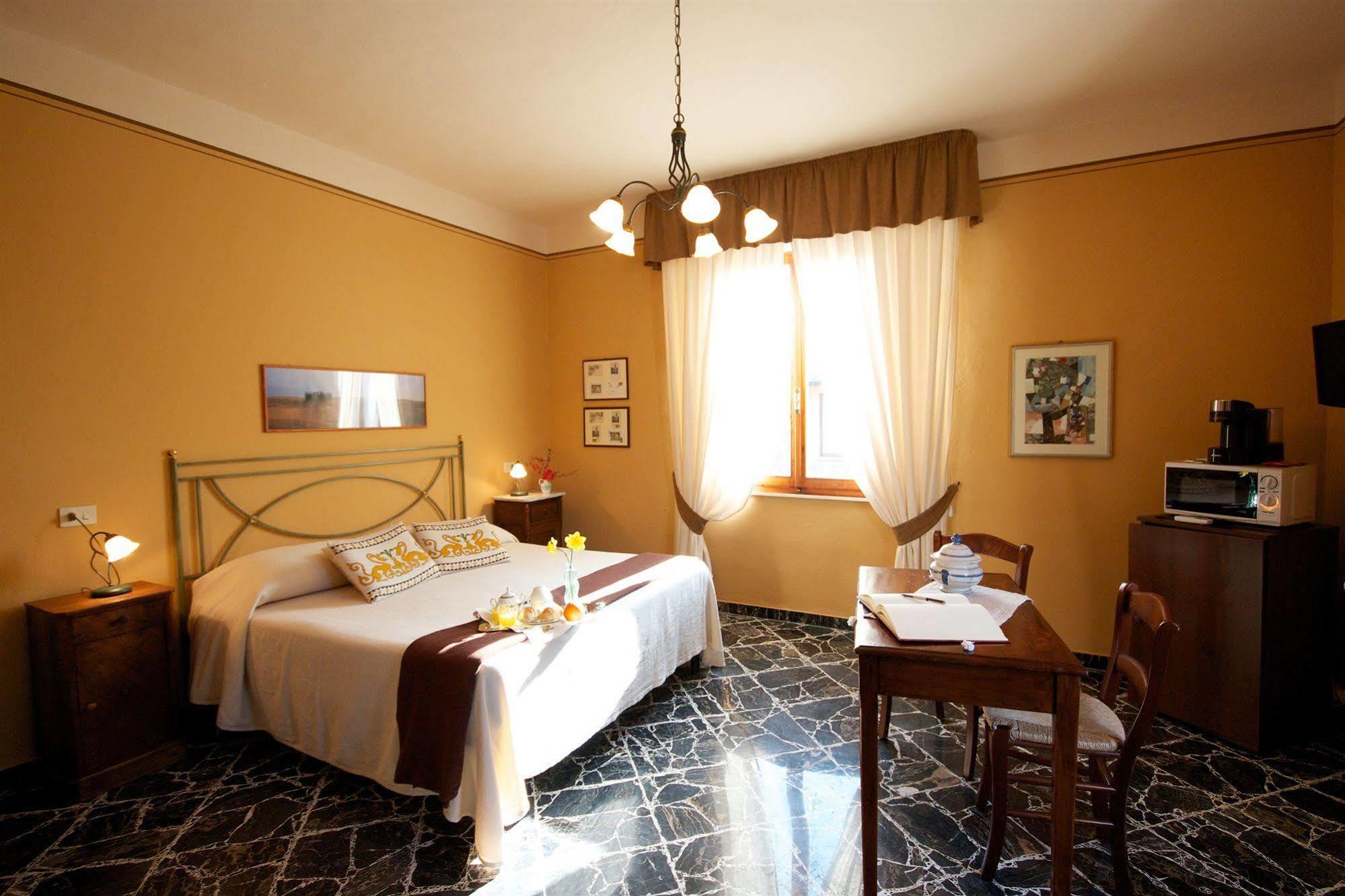 Camera Doppia con Letto Supplementare e con Vista Giardino