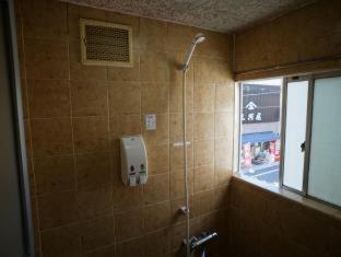 Chambre Triple avec Salle de Bains Commune